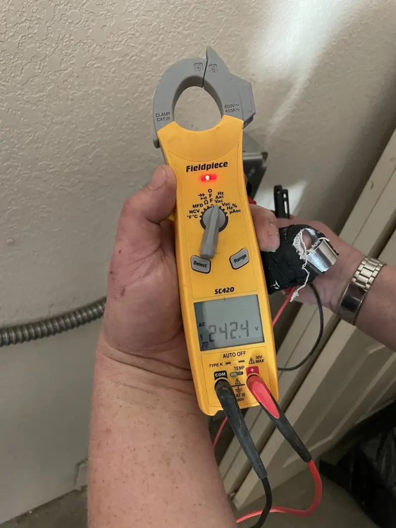 Voltage testing with clamp meter during Hot Tub / Pool Electrical Wiring in Watchung